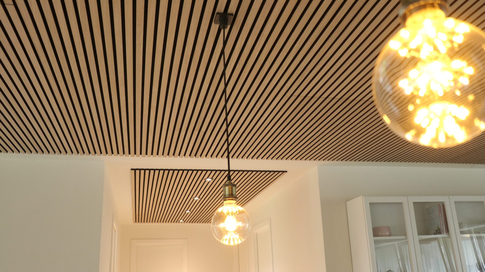 akupanel-classic-oak-black-felt-ceiling-with-spots